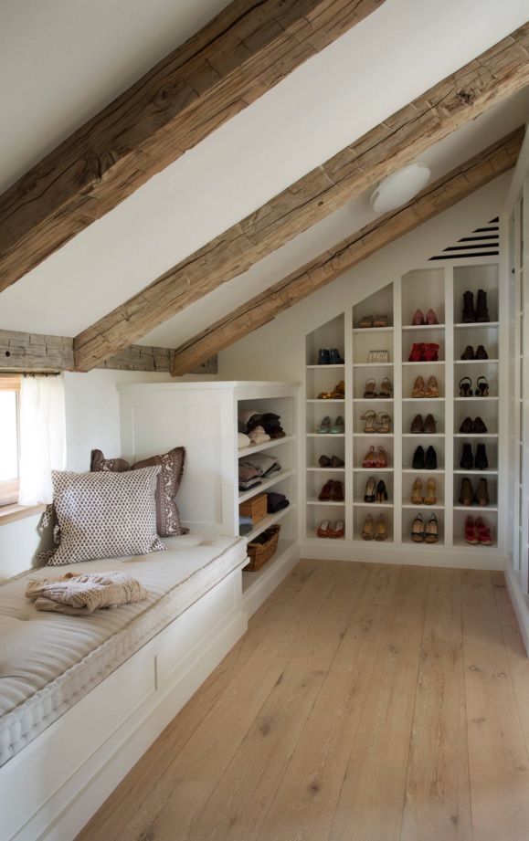 Custom Closet & Shelves & Wardrobe Original Design. Sloped ceiling with beams and a sleeper