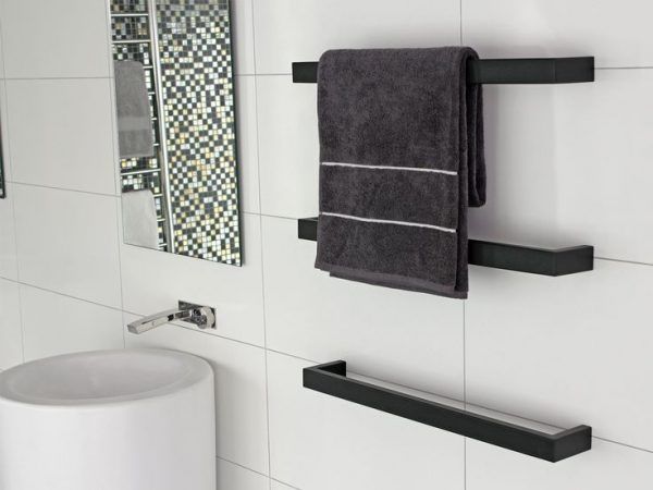 Heated Towel Rail in Bathroom Interior as Practical and Decorative Item