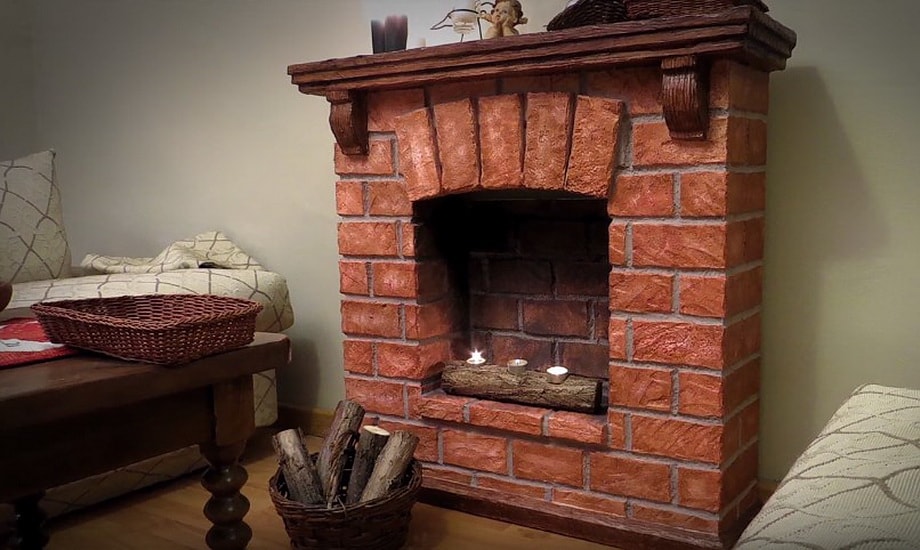 Brickwork imitating fireplace with mantelshelf