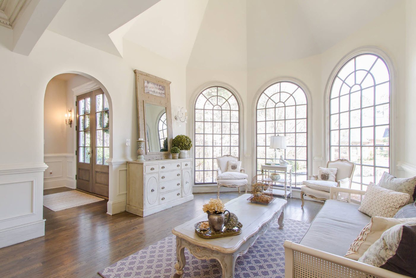 living room with arch windows