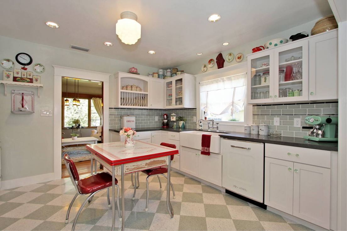 Retro styled kitchen with square large tiles on the floor