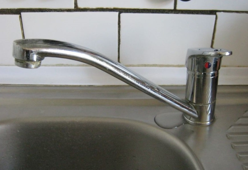kitchen sink faucet leaking at the base